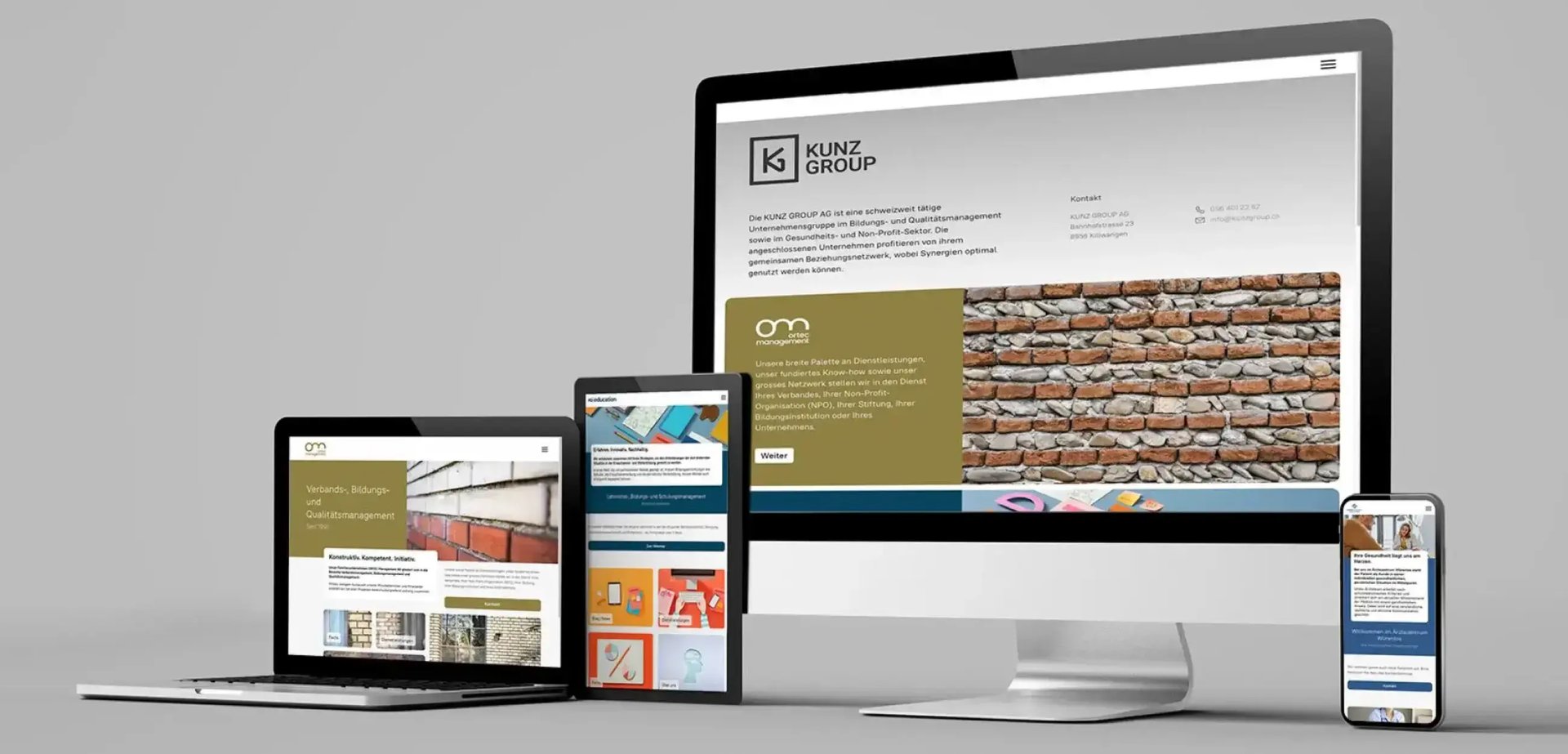 Ein Laptop, ein Tablet, ein Smartphone und ein Bildschirm mit der Kunz-Website.